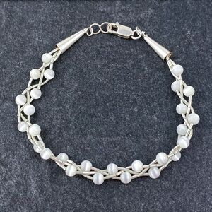 Sterling Liquid Silver 925 Cone Braided White Synthetic Cat's Eye Bracelet 7"